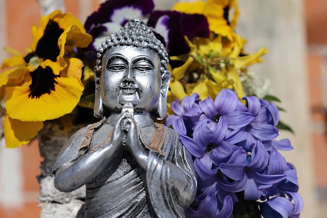 Person practicing mindfulness in a tranquil setting